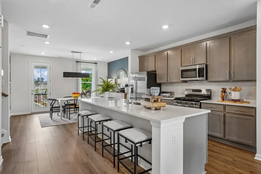 Furnished interior in a model home at South Lake Townes at Flowers Plantation in Clayton (Image 46).