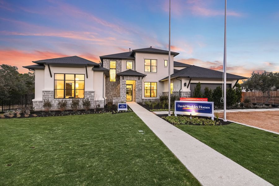 Front exterior of a home in the Caliterra community, located in Dripping Springs, TX (Image 5).