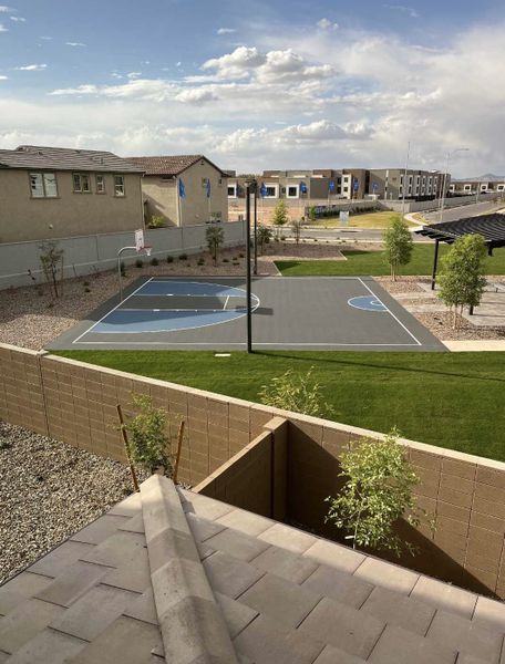 A modern community with a sport court and lush landscaping at Avalon Crossing Inspiration by Lennar (Mesa, AZ). A modern community with a sport court and lush landscaping at Avalon Crossing Inspiration by Lennar (Mesa, AZ).