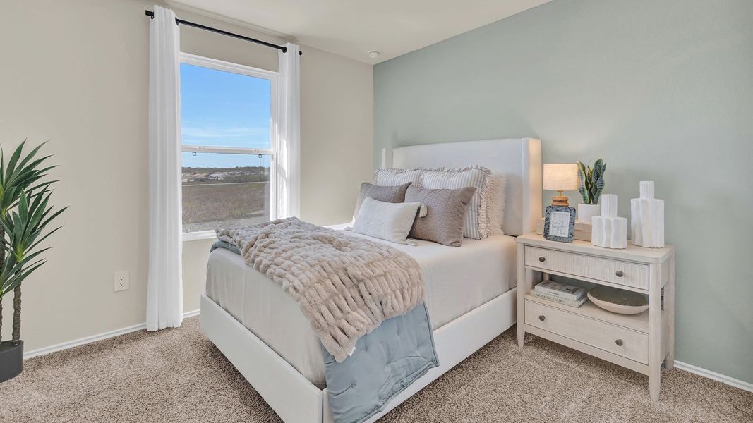Furnished interior in a model home at Sunset Oaks in Maxwell (Image 34).