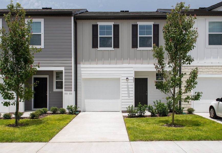 Front exterior of a home in the Temples Crossing community, located in Davenport, FL (Image 3).