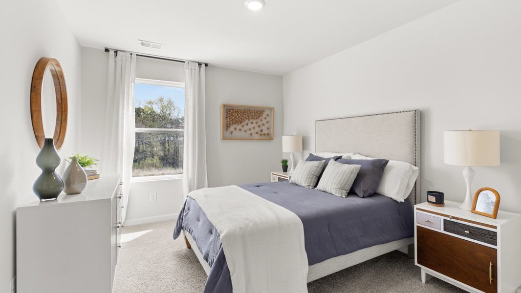 Furnished interior in a model home at Carlton in Douglasville (Image 23).