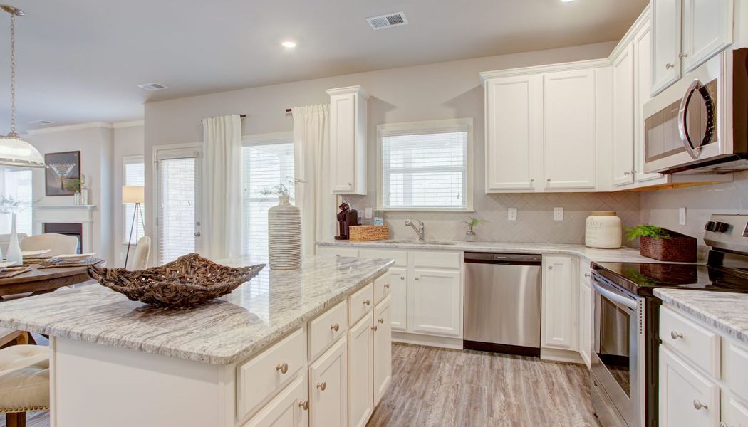 Furnished interior in a model home at Cove Lake Estates in Conley (Image 28).