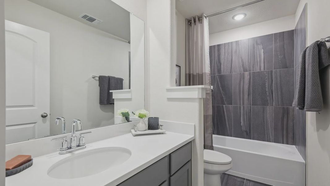 Experience luxury with sleek black tiles, elegant fixtures, and refined detailing in Churchill community. Experience luxury with sleek black tiles, elegant fixtures, and refined detailing in Churchill community.