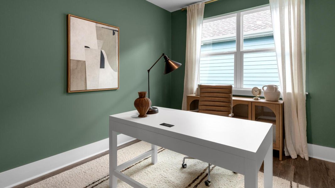 Furnished interior in a model home at The Grove at Blake Farm in Wilmington (Image 8).