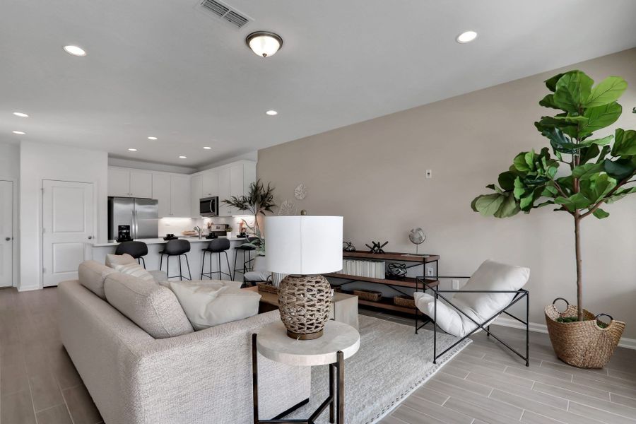 Furnished interior in a model home at Brandon Lakes at Silver Landing in St. Augustine (Image 32).