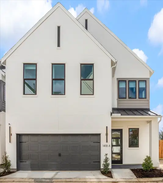 Front exterior of a home in the Caywood Place community, located in Houston, TX (Image 3).