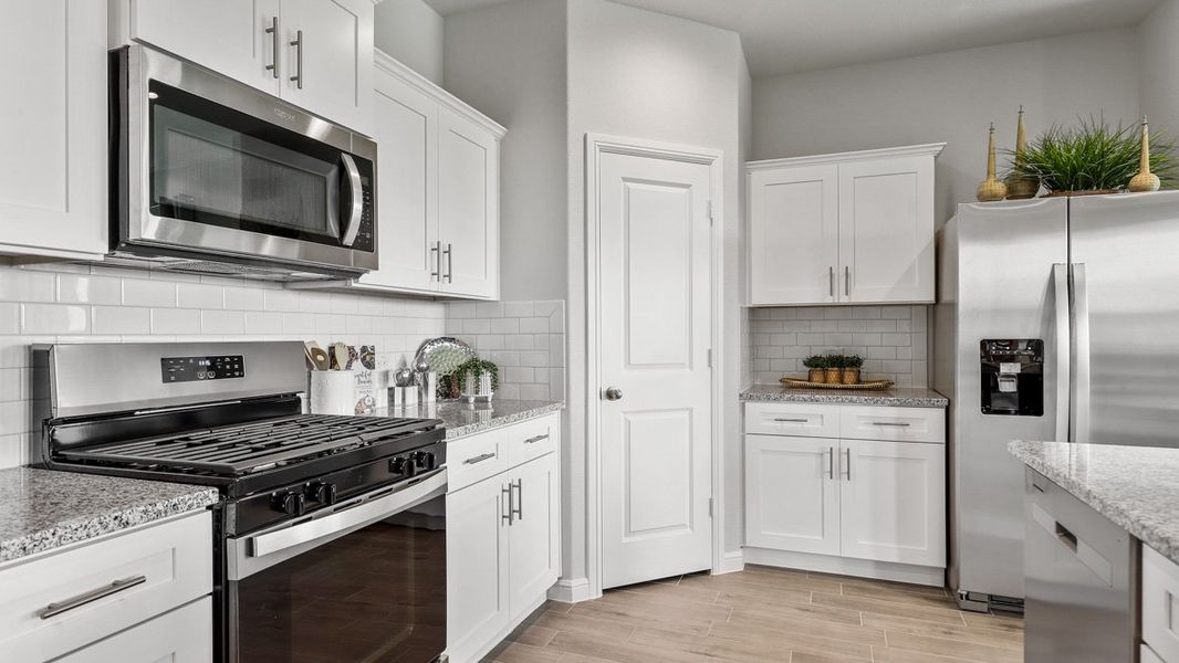 Furnished interior in a model home at Terra Trace in Crowley (Image 9).