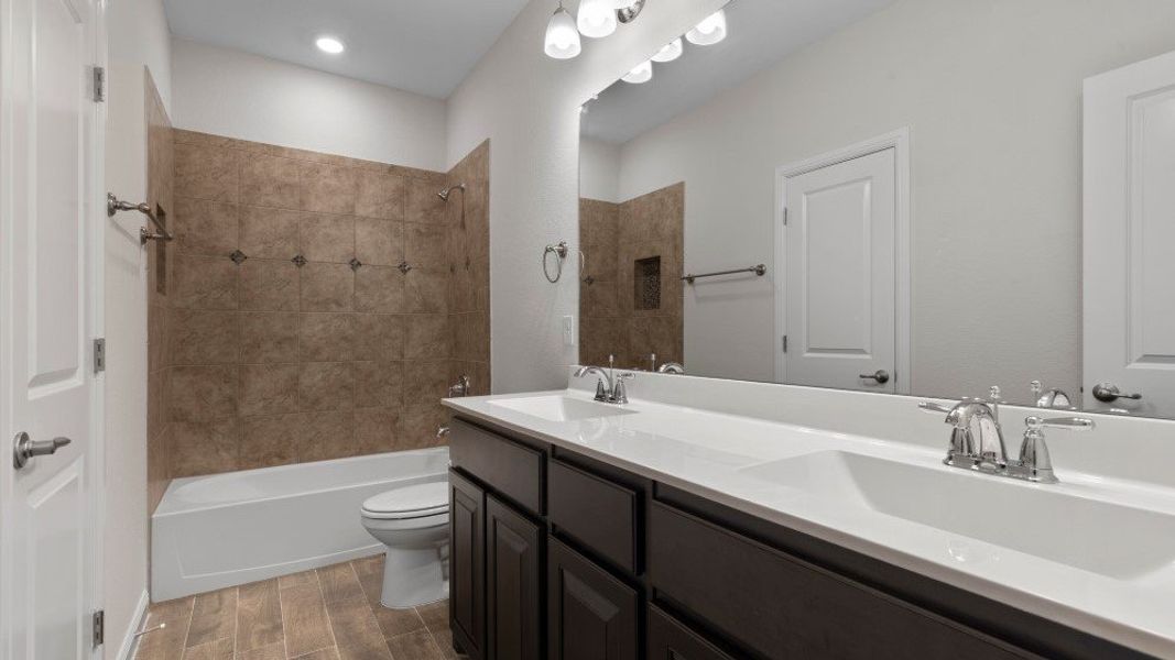 Furnished interior in a model home at Eden Ranch in Arlington (Image 21).