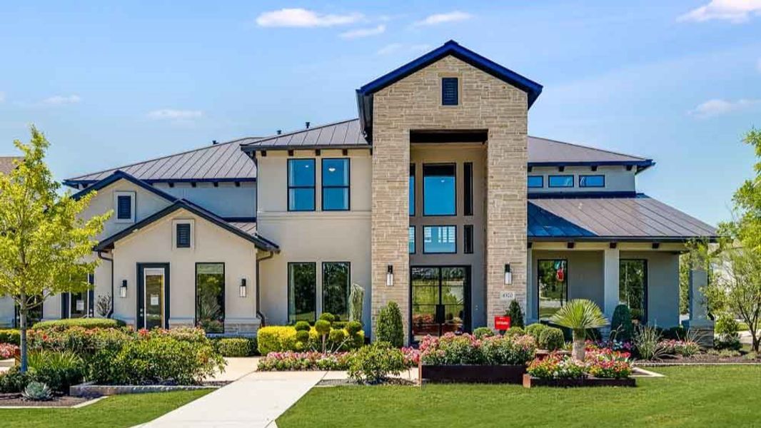 Front exterior of a home in the Travisso Florence Collection community, located in Leander, TX (Image 4).
