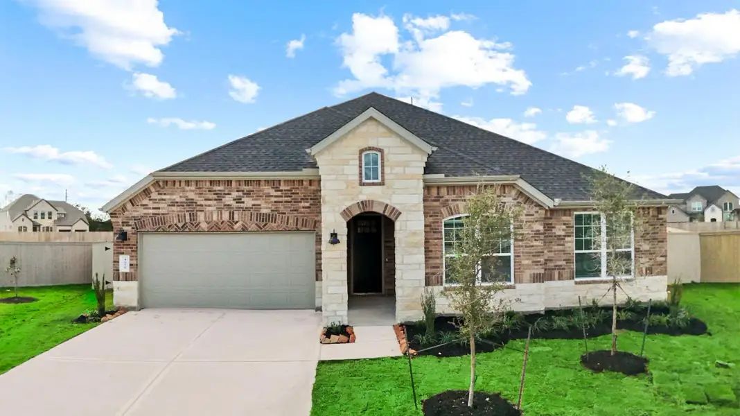 Front exterior of a home in the Lago Mar 60' Homesites community, located in Texas City, TX (Image 16).
