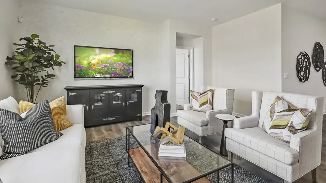 Furnished interior in a model home at Porters Landing in Wendell (Image 5).