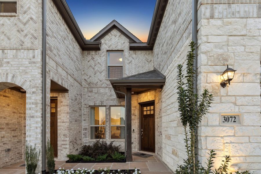 Front exterior of a home in the Timber Ridge community, located in Corinth, TX (Image 9).
