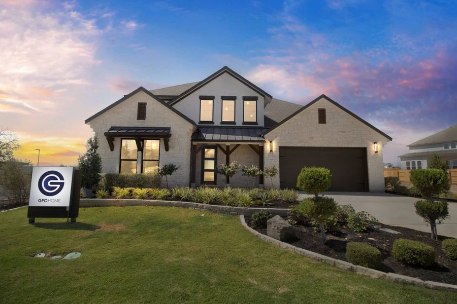 Front exterior of a home in the Crescent Bluff community, located in Georgetown, TX (Image 4).