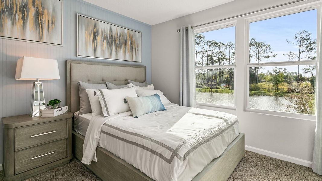 Furnished interior in a model home at Stokes Landing Express in St. Augustine (Image 14).