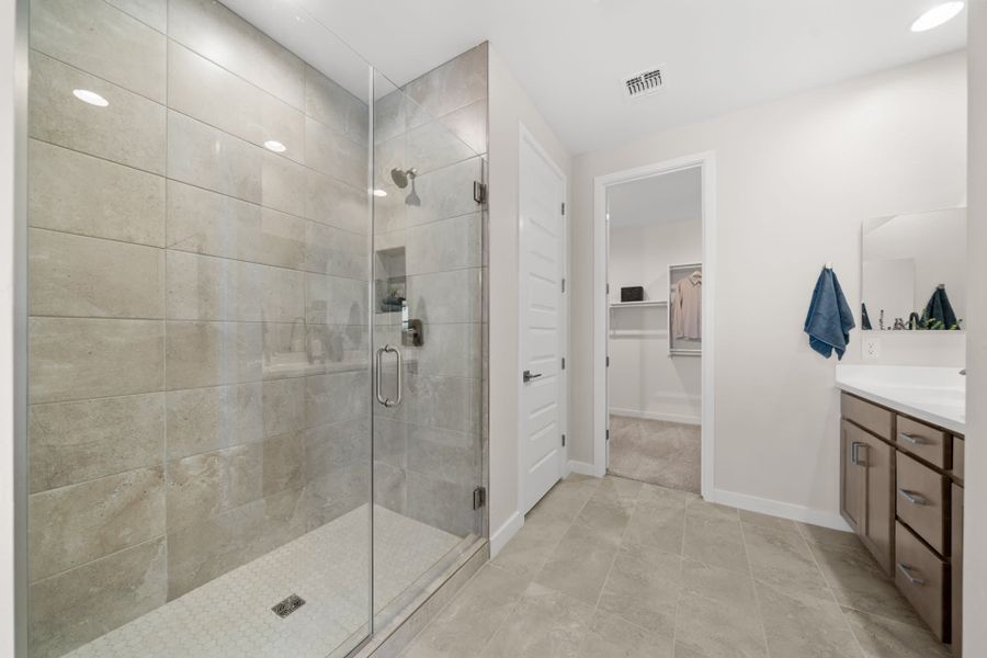 Primary Bathroom Shower | Radiance Floorplan | Elara at Moonlight | New Homes in Maricopa, AZ by Landsea Homes