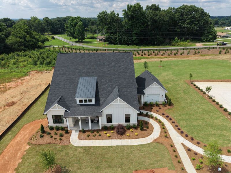 A house with a solar panel. A house with a solar panel.