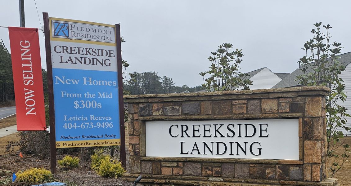 Entrance to the Creekside Landing community in Dallas, GA, featuring signage and landscaping (Image 6).