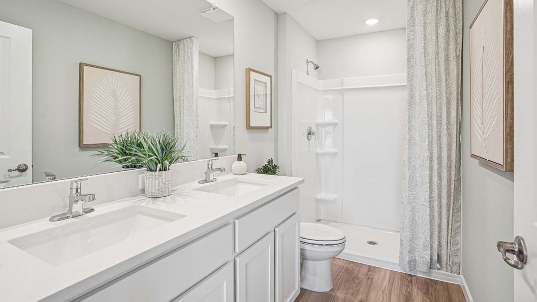 Furnished interior in a model home at Fletcher Trace in Alachua (Image 20).