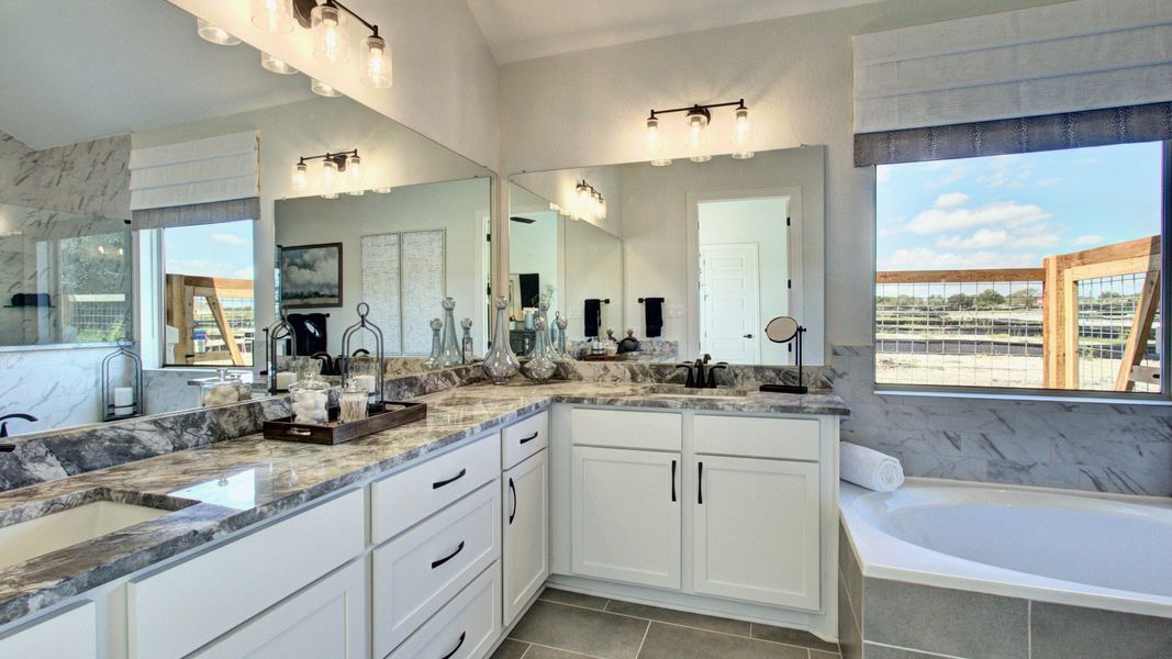 Furnished interior in a model home at The Crossvine in Schertz (Image 27).