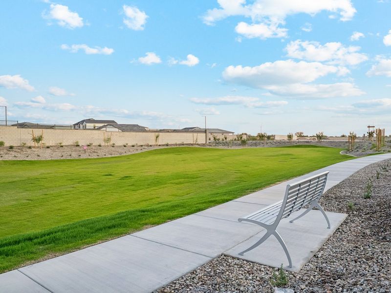 A bench sits unoccupied. A bench sits unoccupied.