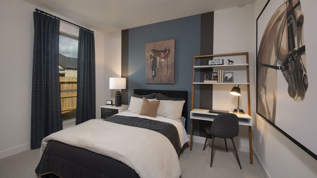 Furnished interior in a model home at Amira 50' in Tomball (Image 17).