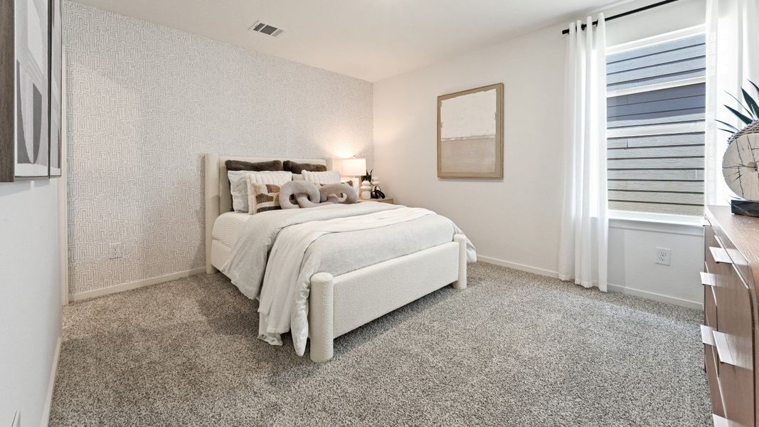 Furnished interior in a model home at Westward Pointe in Sealy (Image 37).
