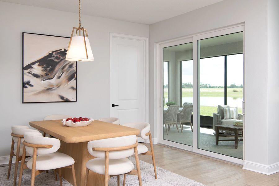 Furnished interior in a model home at Oakfield Trails Signature in Parrish (Image 3).