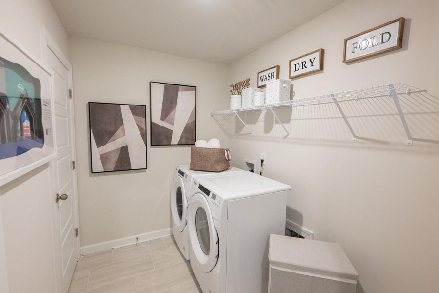 Furnished interior in a model home at Chatham Forest in Duncan (Image 5).