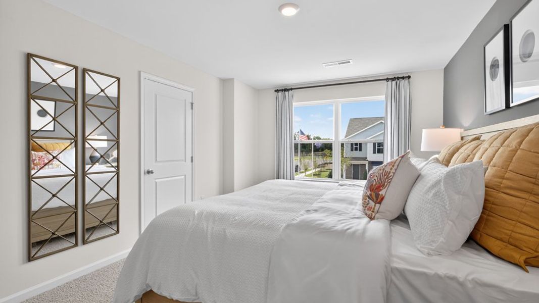 Furnished interior in a model home at The Townes at Belle Grove in Wendell (Image 32).