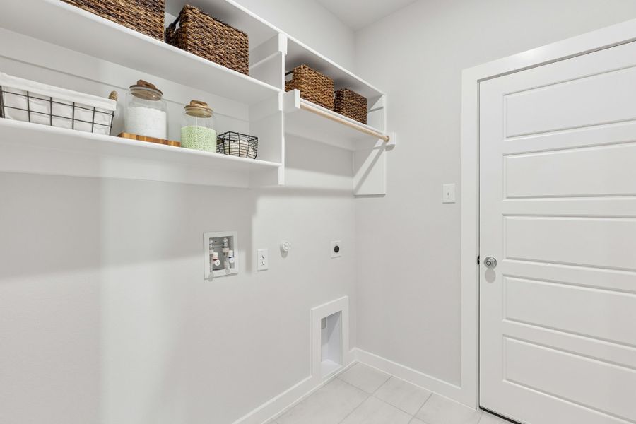 Utility Room in a Nicholson Ranch Cedar Model Home in Lavon TX by Trophy Signature Homes