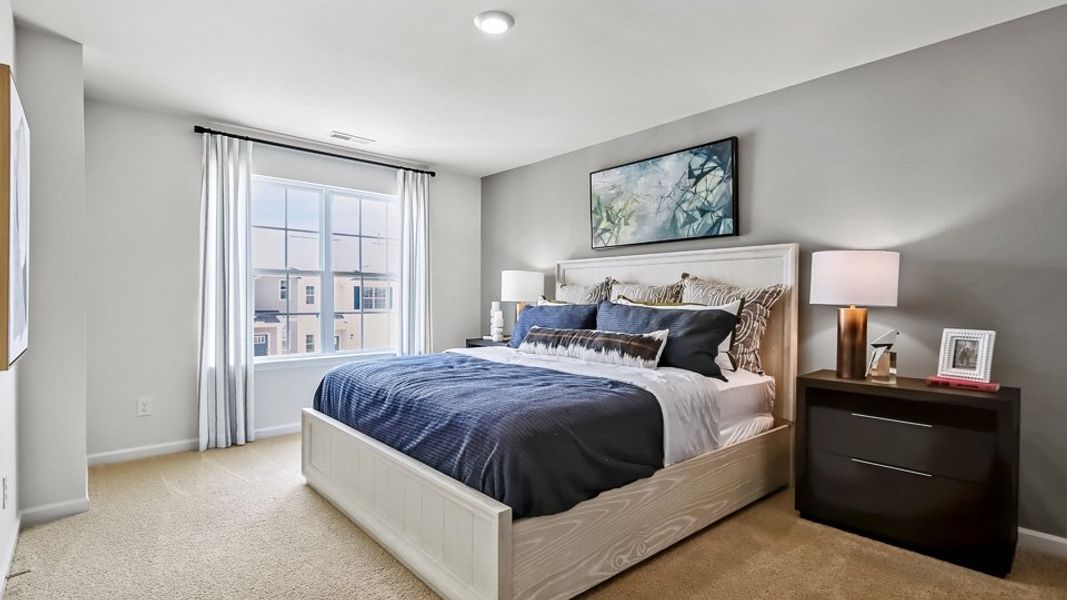 Furnished interior in a model home at The Townes at Prestleigh in Wake Forest (Image 26).