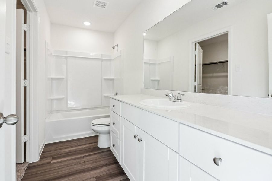 Furnished interior in a model home at The Landing in New Caney (Image 8). Furnished interior in a model home at The Landing in New Caney (Image 8).