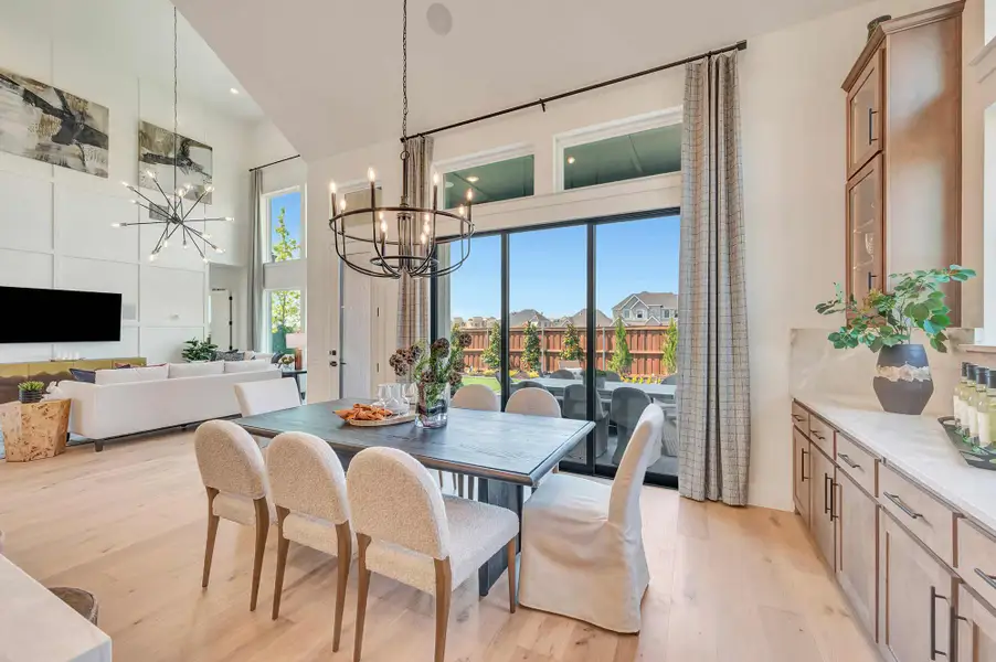 Furnished interior in a model home at Whyburn Manor Series in Flower Mound (Image 4).