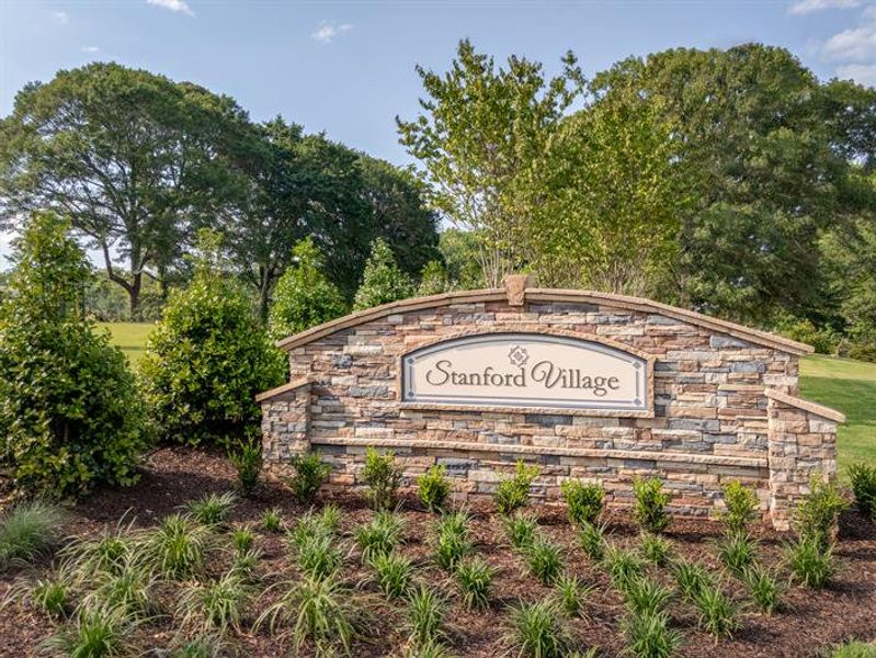 Entrance to the Stanford Village community in Lyman, SC, featuring signage and landscaping (Image 1).