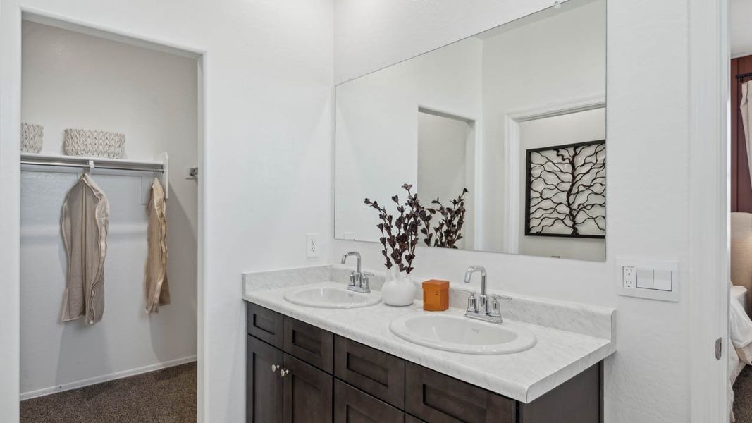 Furnished interior in a model home at Elena Trails in Maricopa (Image 17).