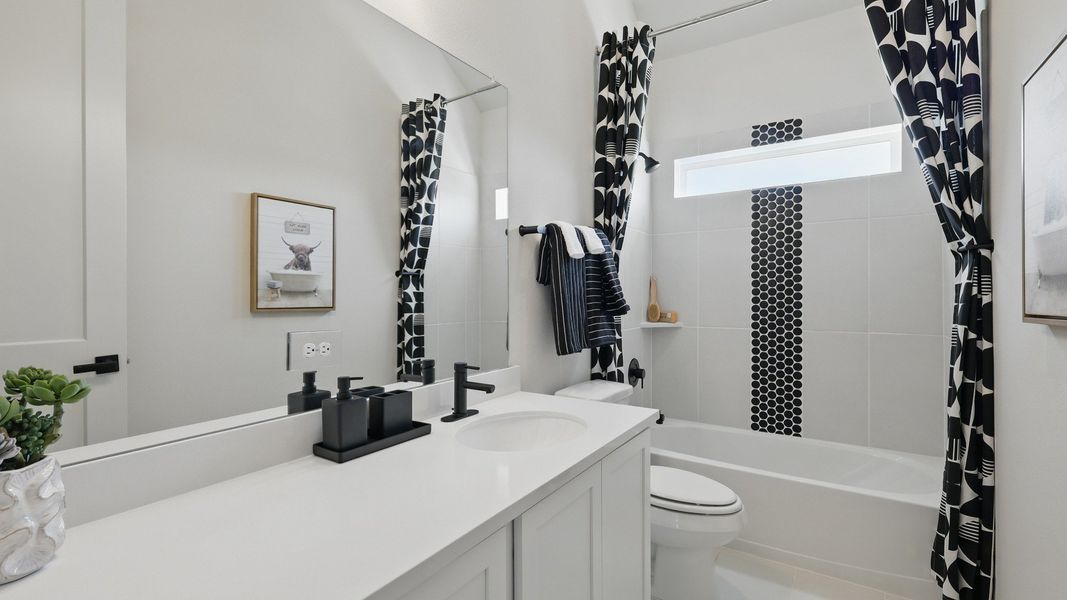 Furnished interior in a model home at Westridge Premier in San Antonio (Image 17).