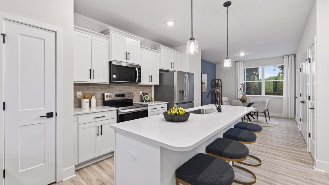Furnished interior in a model home at Kingman Townhomes in Charlotte (Image 6).