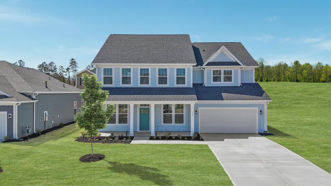 Blue 2 story home with large parking pad and street tree at Pinebrook by DRB Homes in Woodruff, SC Blue 2 story home with large parking pad and street tree at Pinebrook by DRB Homes in Woodruff, SC