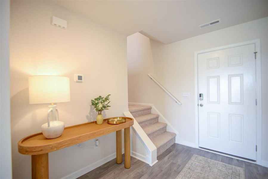 Furnished interior in a model home at Butterfield in Kinston (Image 13).