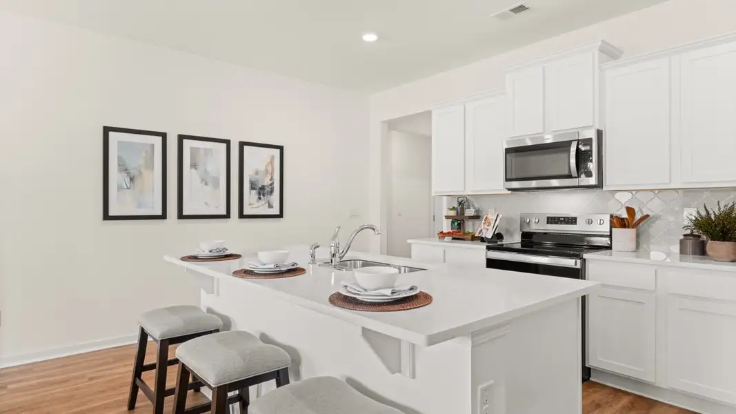 Furnished interior in a model home at Champion's Run in Lithonia (Image 7).