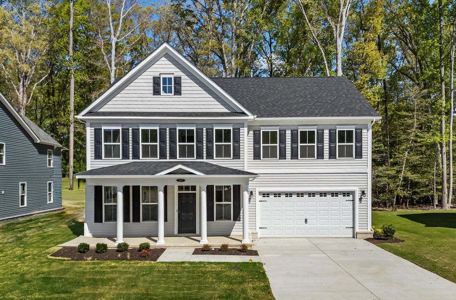 Front exterior of a home in the The Farm at Neill's Creek community, located in Lillington, NC (Image 3).