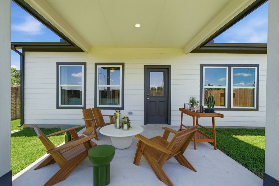A house with a table and chairs. A house with a table and chairs.
