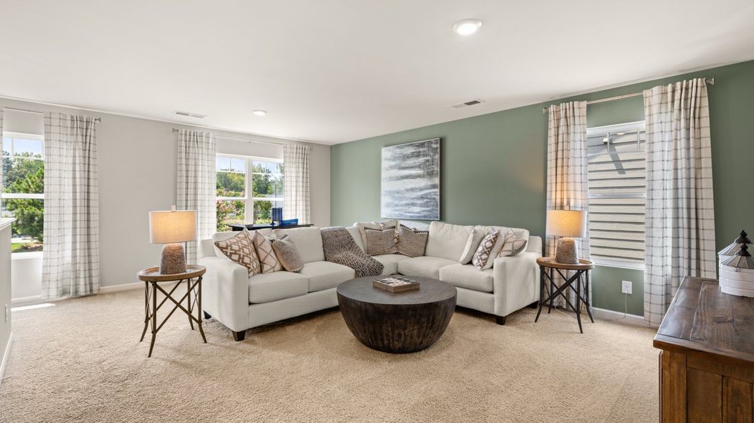 Furnished interior in a model home at Twin Lakes in Hoschton (Image 53).