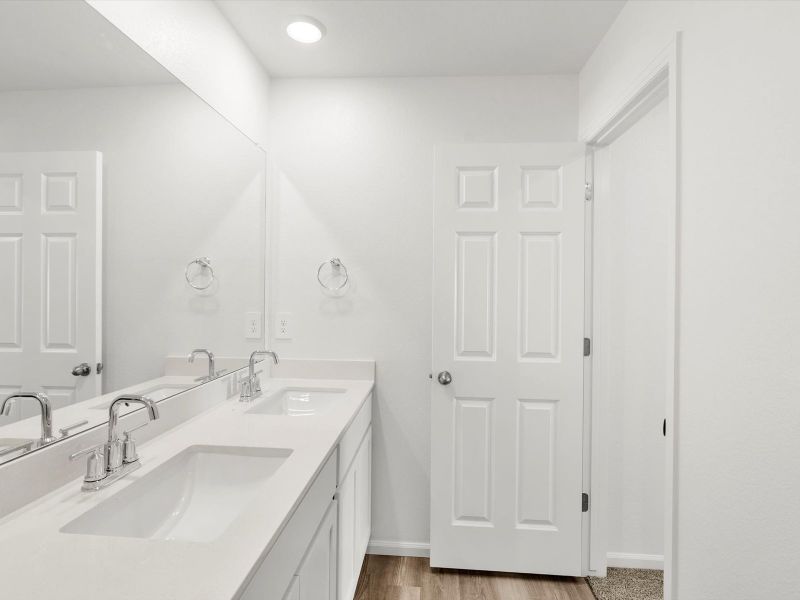Furnished interior in a model home at Frontier Estates - The Trails Collection in Firestone (Image 18).