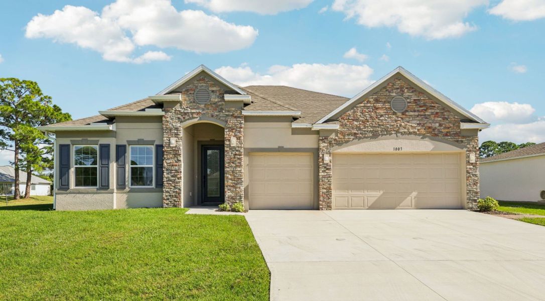 Front exterior of a home in the Malabar Springs community, located in Palm Bay, FL (Image 9). Front exterior of a home in the Malabar Springs community, located in Palm Bay, FL (Image 9).