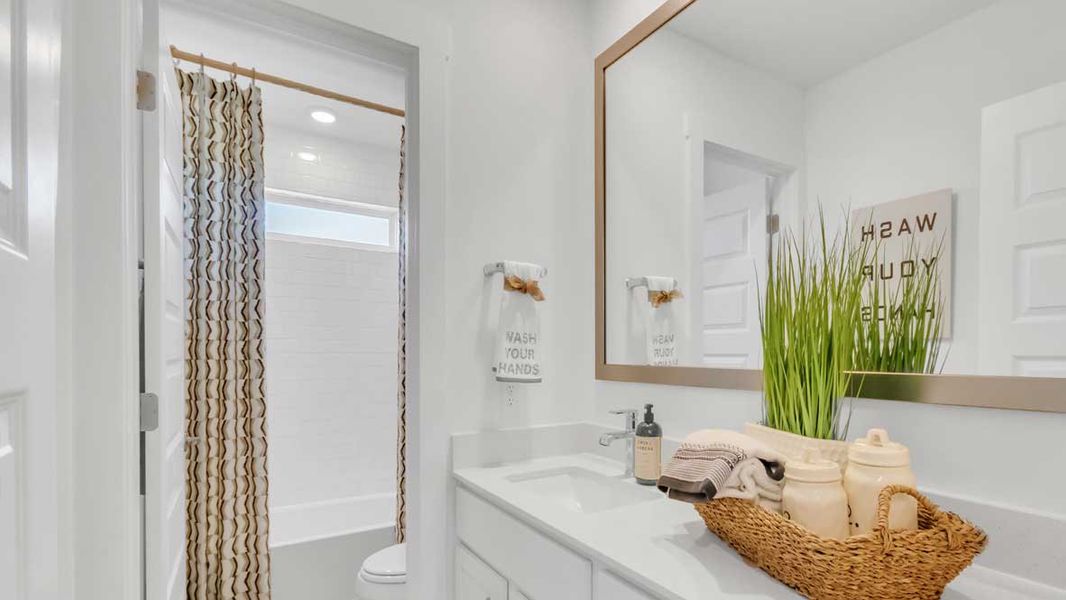 Furnished interior in a model home at Rosenbusch Ranch in Leander (Image 50).