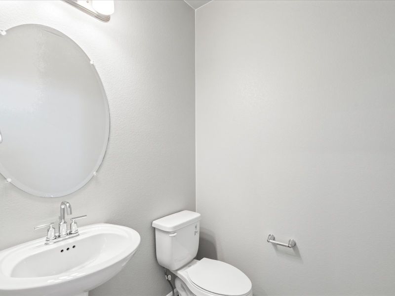 Bathroom in the Woodland floorplan at a Meritage Homes community in Broomfield, CO.