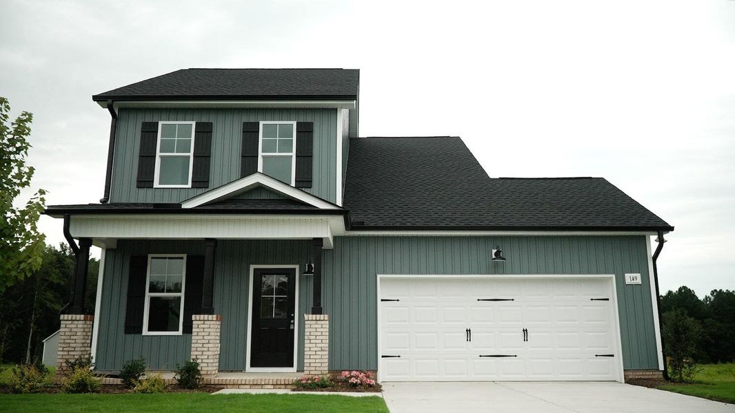 Front exterior of a home in the Riverside community, located in Zebulon, NC (Image 4). Front exterior of a home in the Riverside community, located in Zebulon, NC (Image 4).