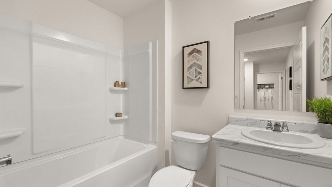 Furnished interior in a model home at Inverness at Sugarloaf in Lawrenceville (Image 28).